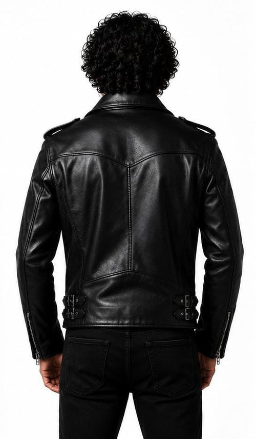 A person viewed from the back wearing a black leather moto jacket and black pants against a plain white background.