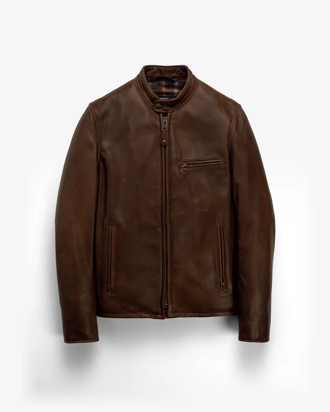 A dark brown leather jacket with a stand-up collar, front zipper, zippered chest pocket, and zippered side pockets, displayed against a light gray background.