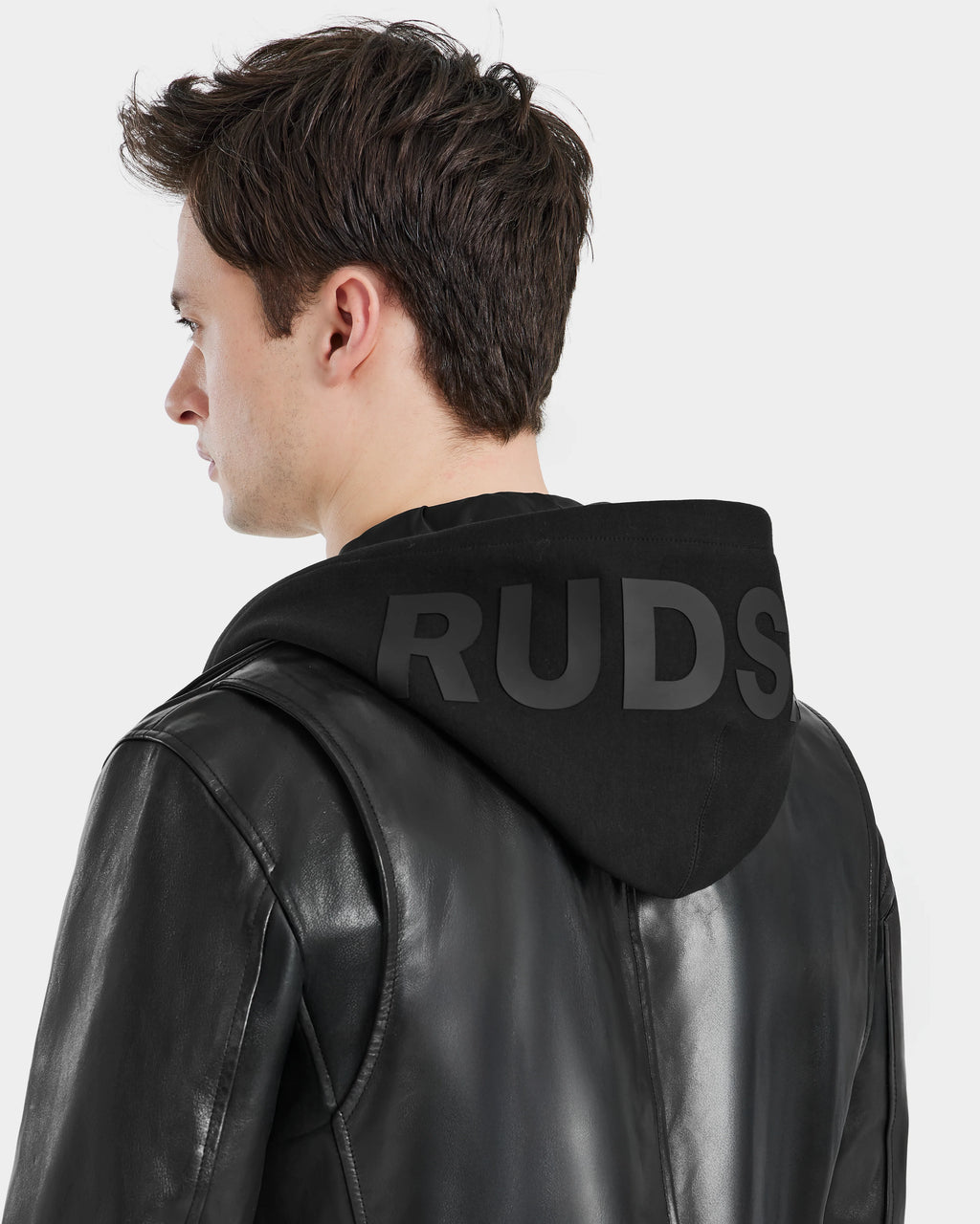 Rear view of male model wearing MANUS B Men's Leather Moto Jacket by Pelleaura