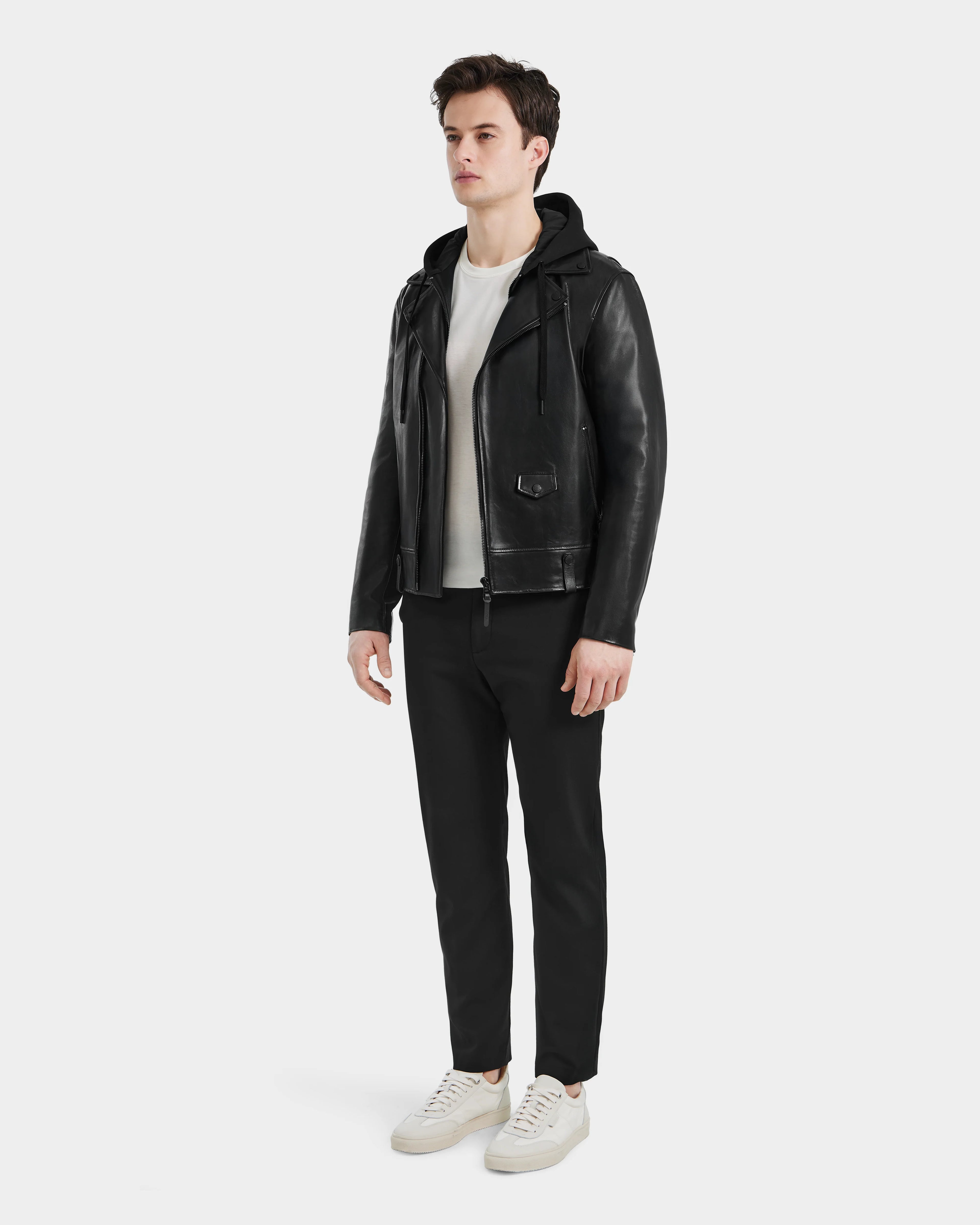 Side profile of MANUS B Men's Black Leather Moto Jacket with modern biker design