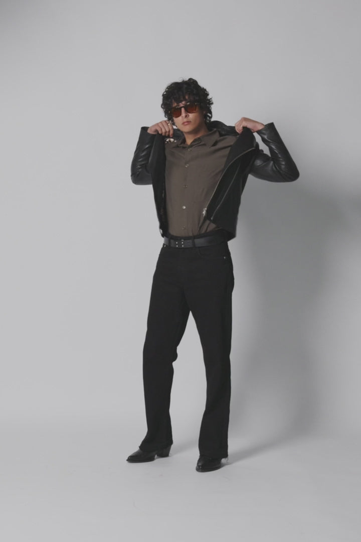 Male model wearing the Outrider Leather Jacket, showcasing front and back views to highlight the premium leather design, fit, and classic style