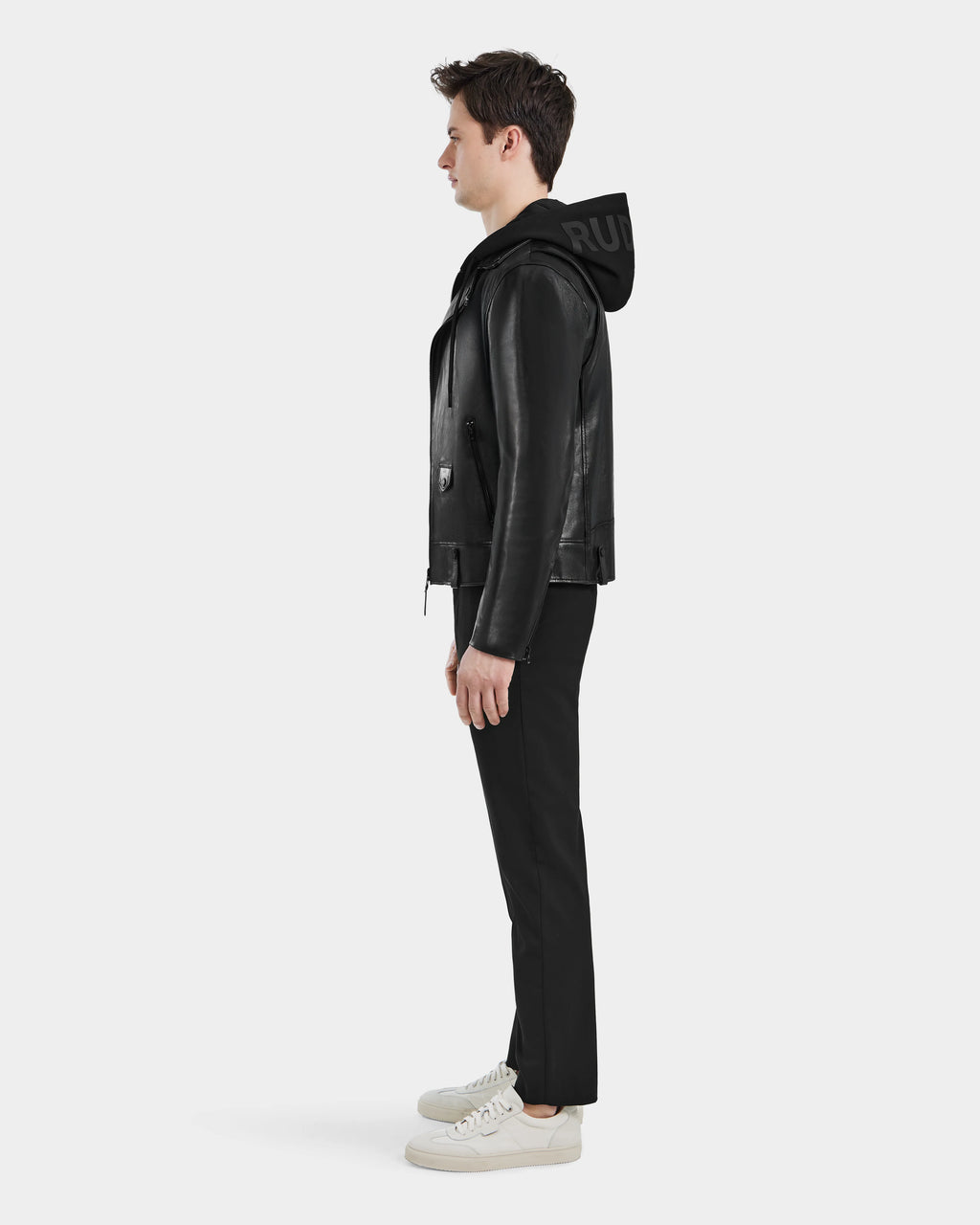Side profile of MANUS B Men's Black Leather Moto Jacket with modern biker design