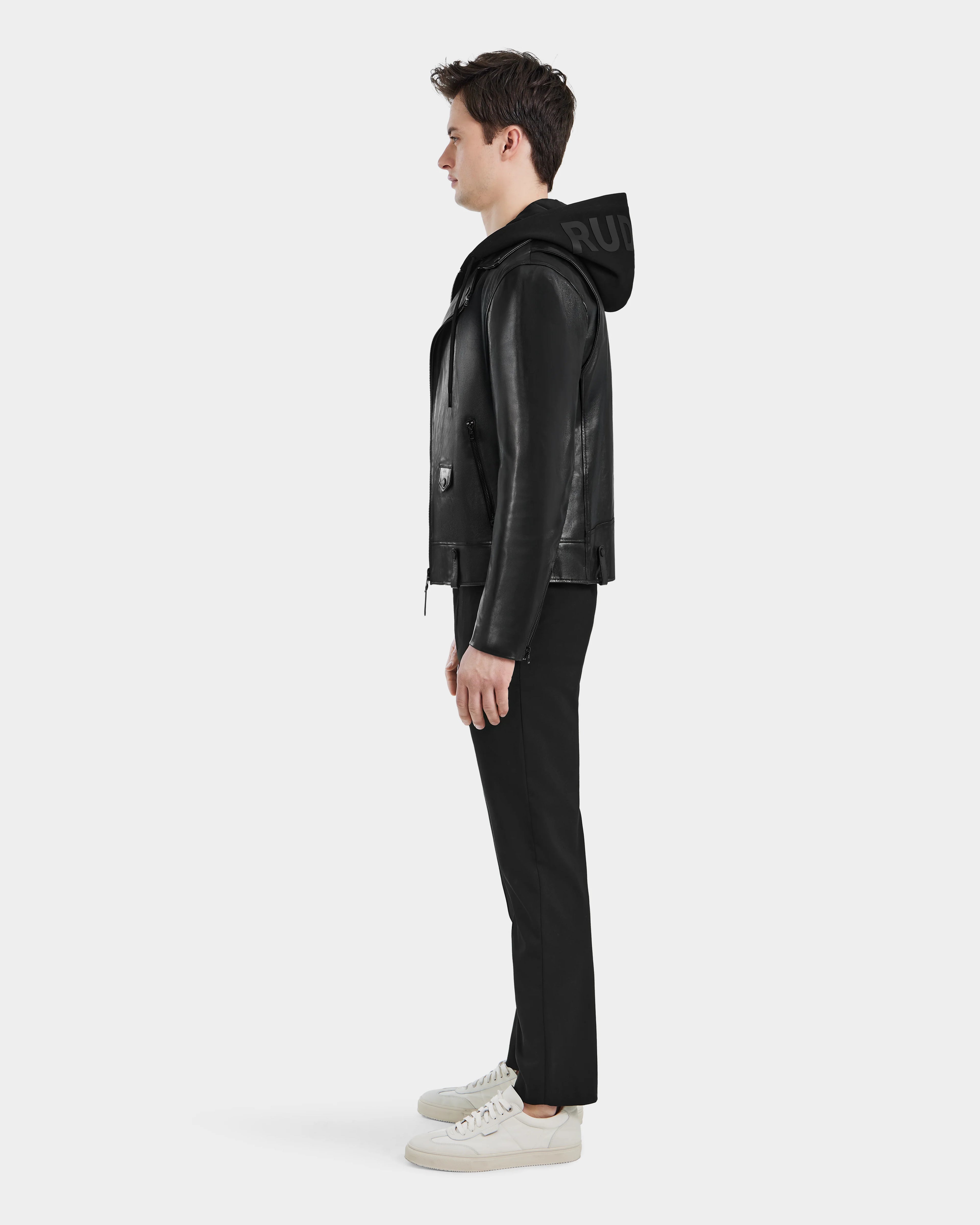 Side profile of MANUS B Men's Black Leather Moto Jacket with modern biker design